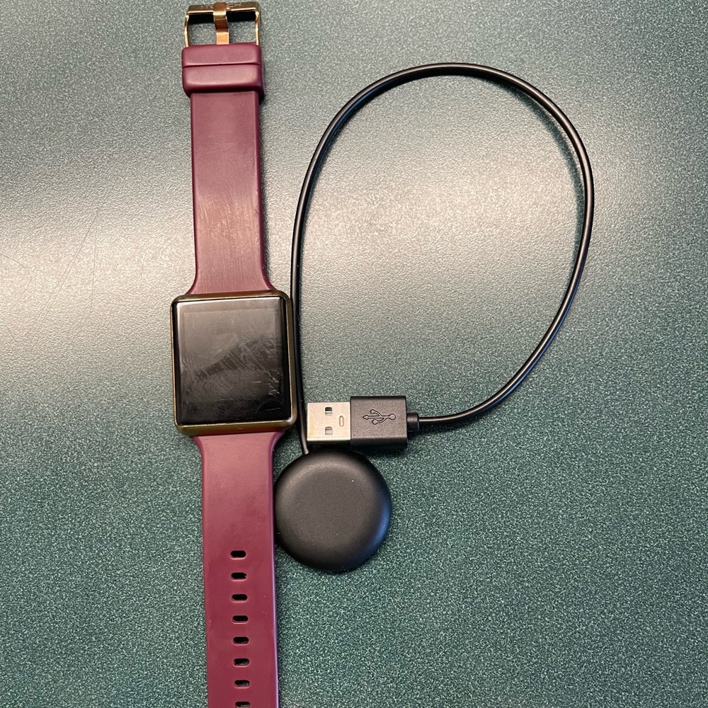 iTouch Air smart watch with burgundy band and charger
